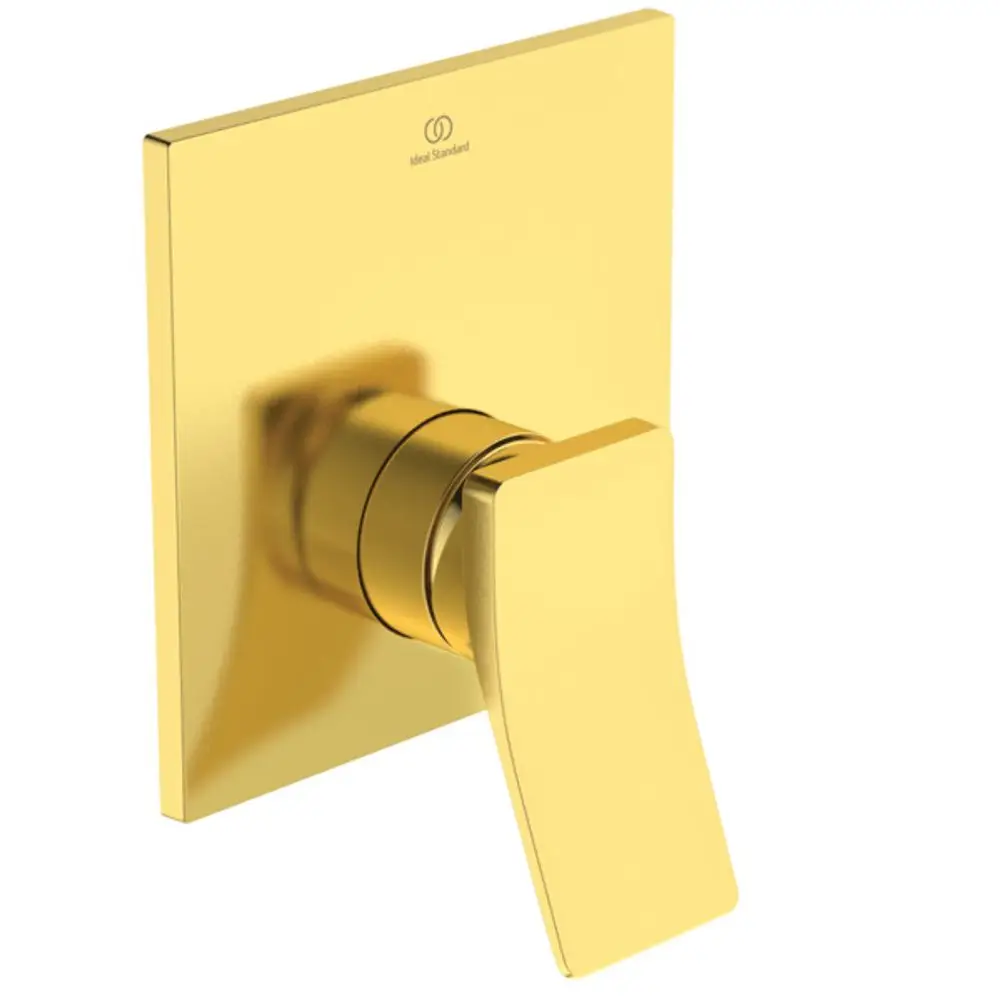 Goldene Brausearmatur von Ideal Standard mit quadratischem Deckel und einem hebelartigen Bediengriff, montiert an der Wand.